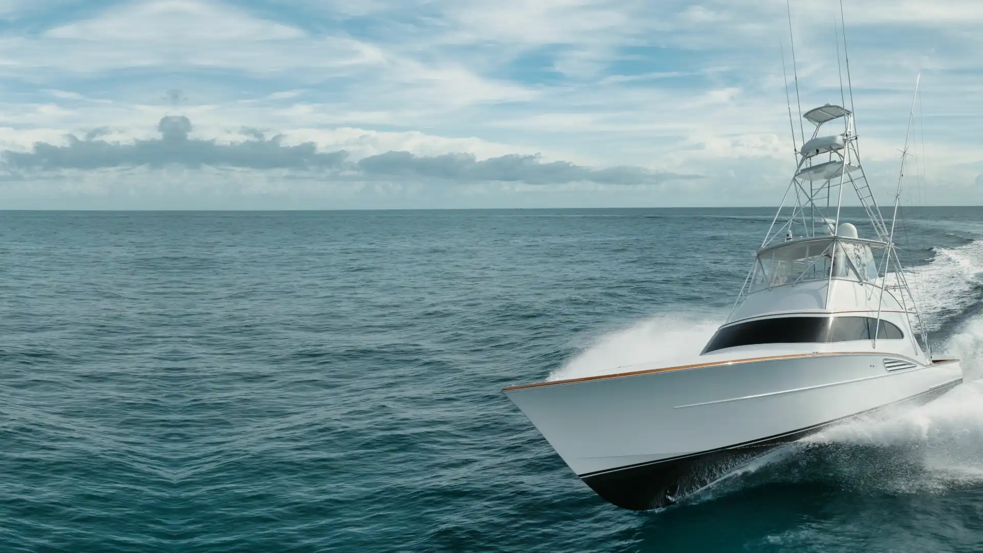 Couple enjoying yacht on the water.