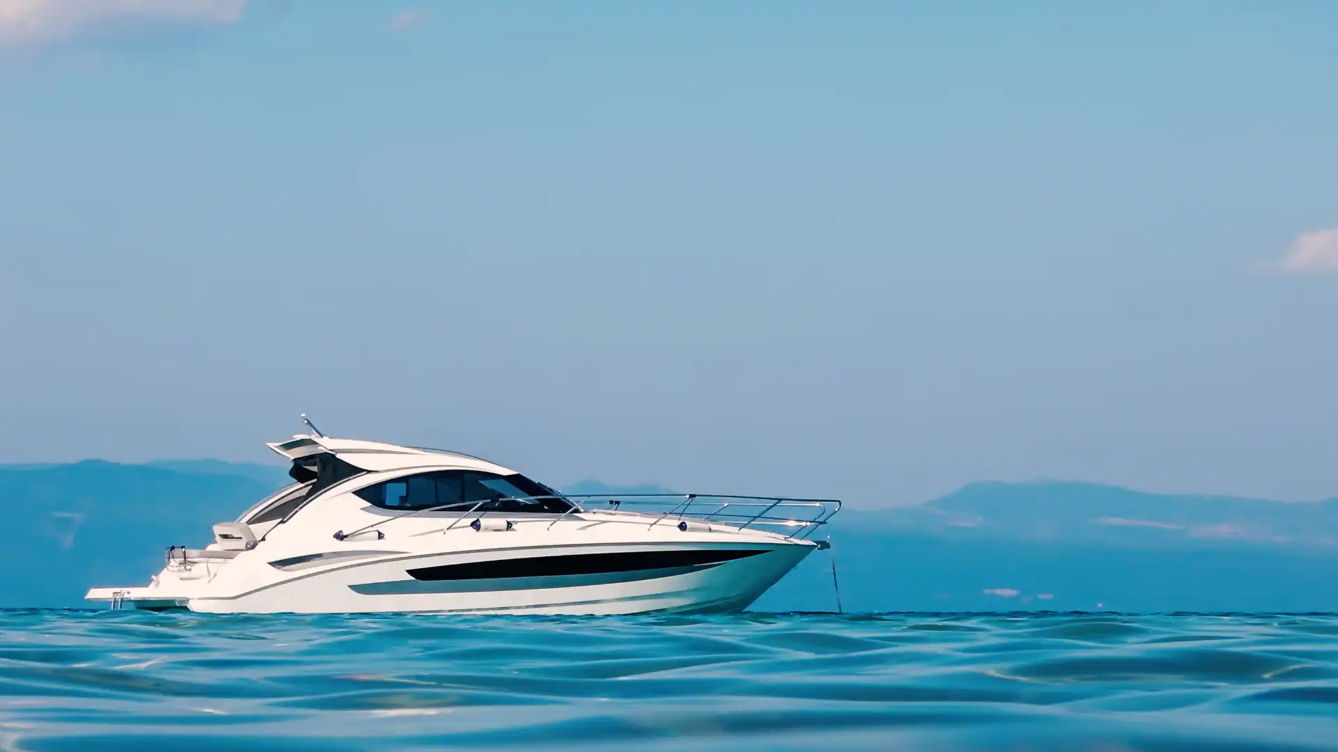 Couple enjoying yacht on the water.